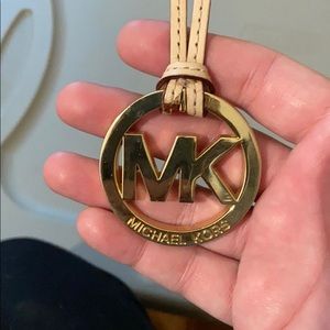 MK bag tag